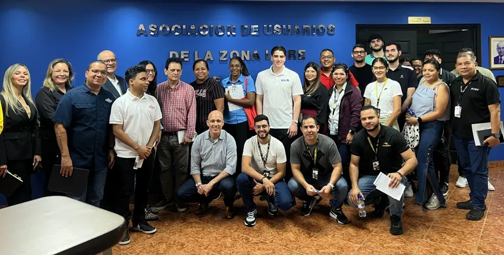 Emilio Nils with business owners after a talk